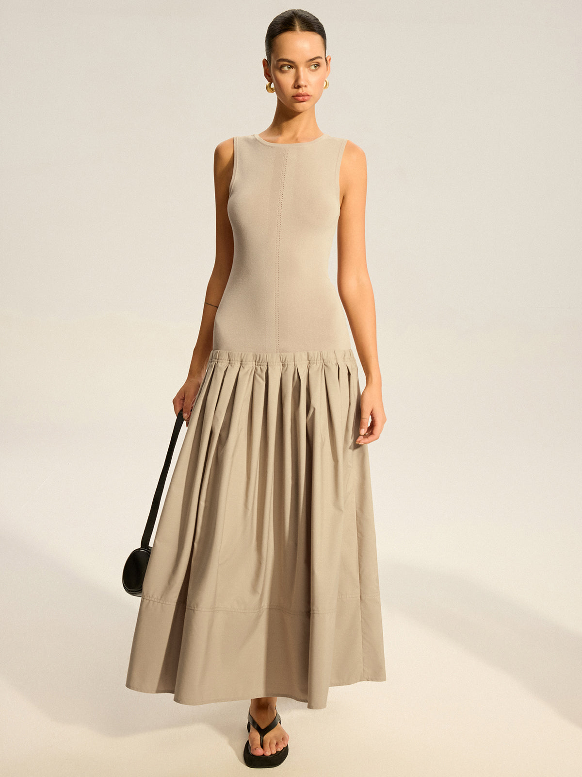 Elegance - Stylowa lekko rozciągliwa sukienka midi zzianinowym topem i plisowanym dołem